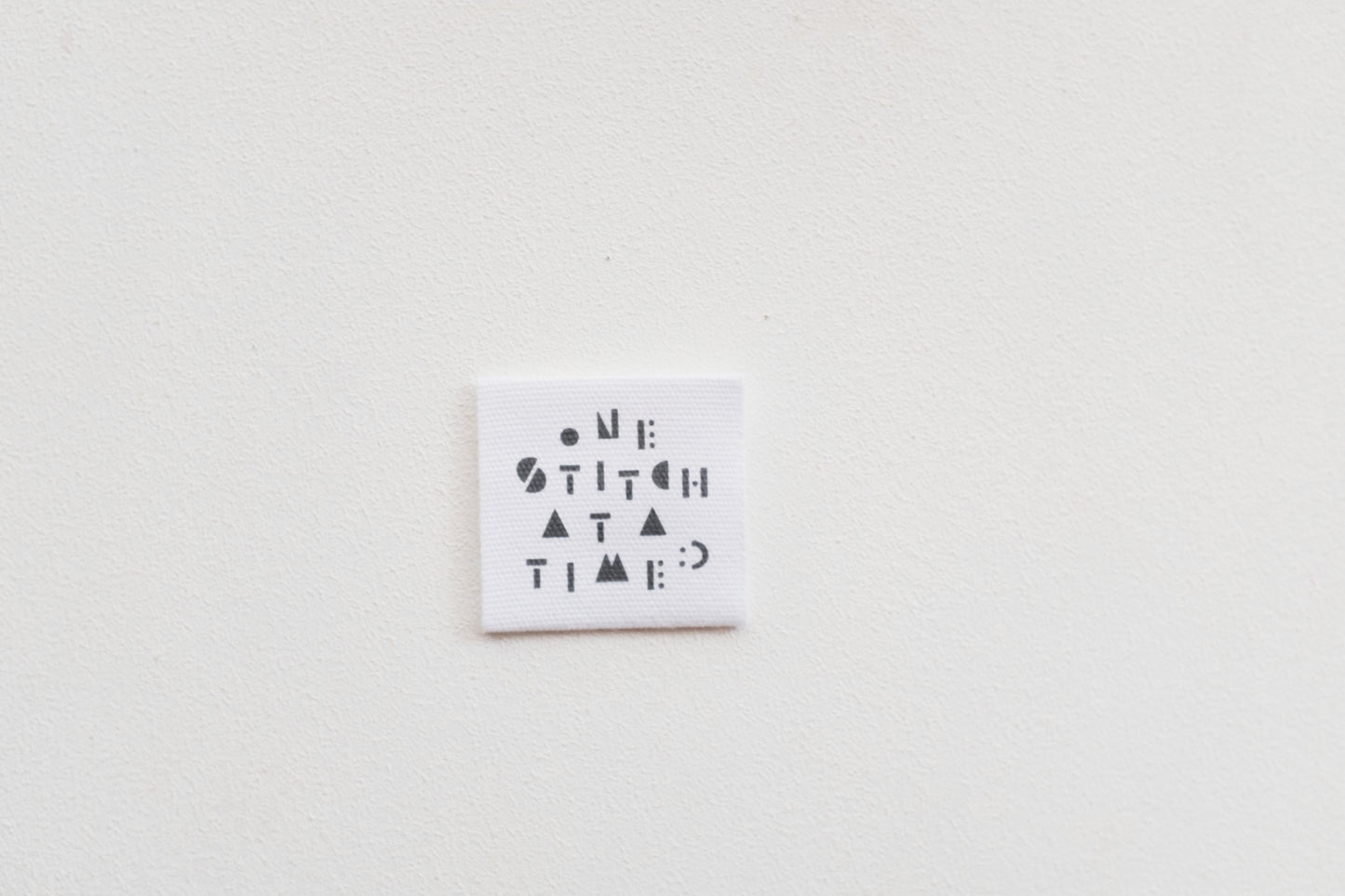 ONE STITCH AT A TIME コットンタグ