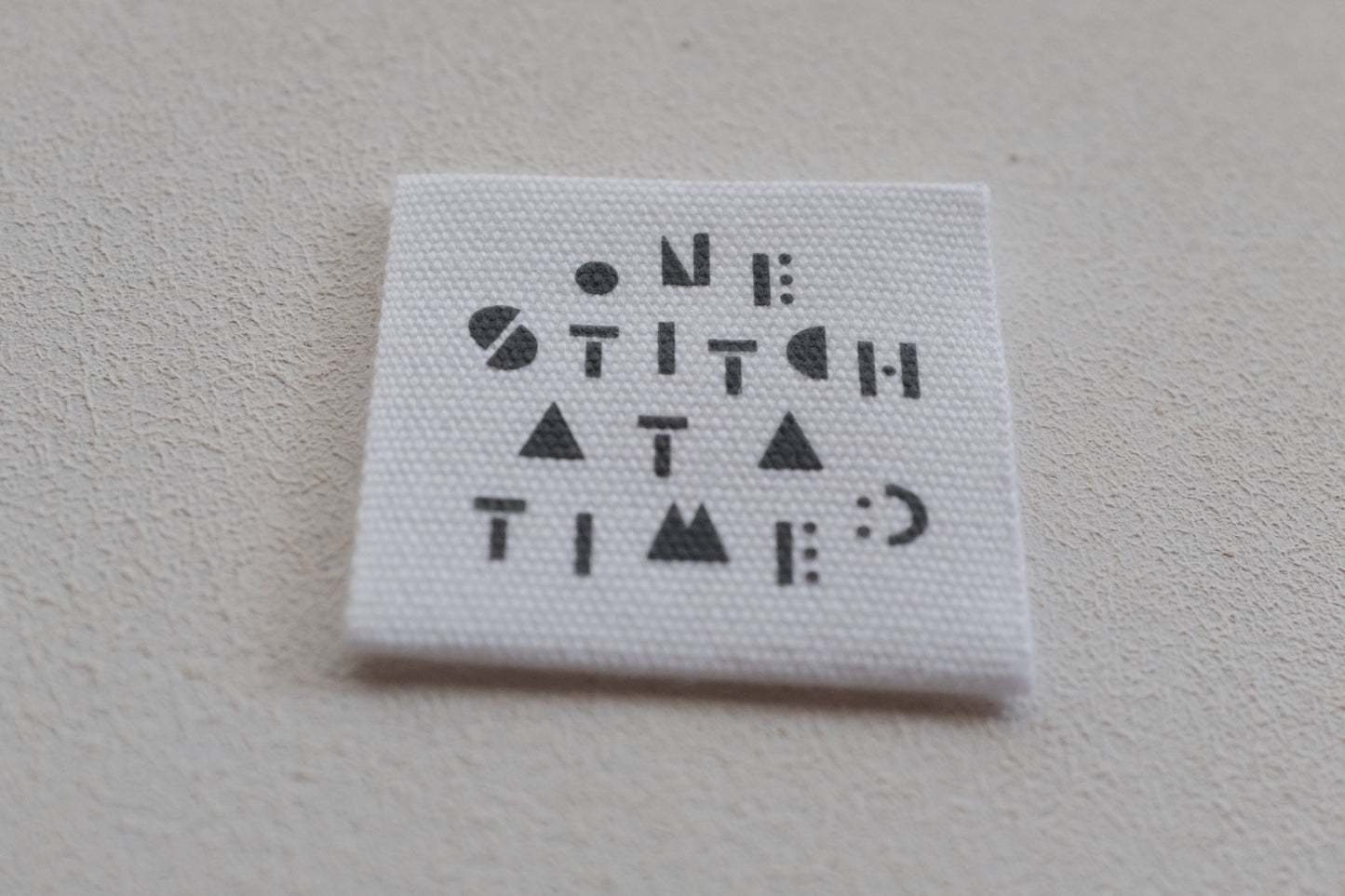 ONE STITCH AT A TIME コットンタグ