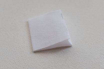 ONE STITCH AT A TIME コットンタグ